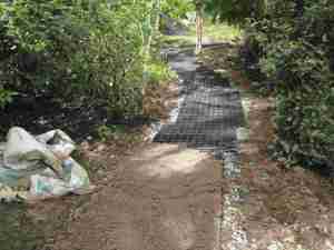 Start of pea gravel fill of GeoBlock path